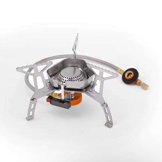 Portable backpacking stove with piezo ignition