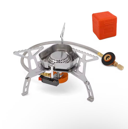 Portable backpacking stove with piezo ignition